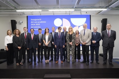 Representats de les universitats catalanes amb el president Illa, en l'acte d'inauguració